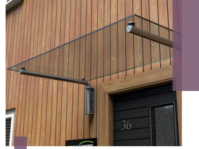 Стеклянные козырьки на входы и фасады в Мурманске